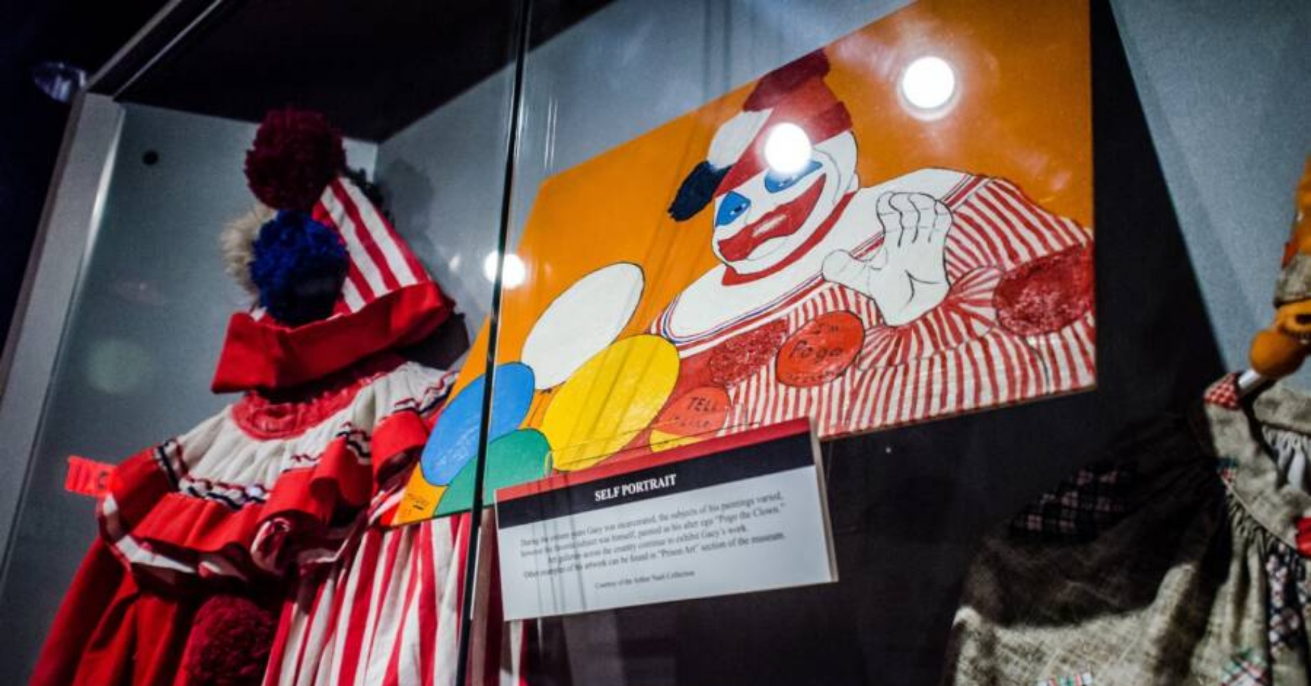 John Wayne Gacy paintings and memorabilia on display at the National Crime Museum.