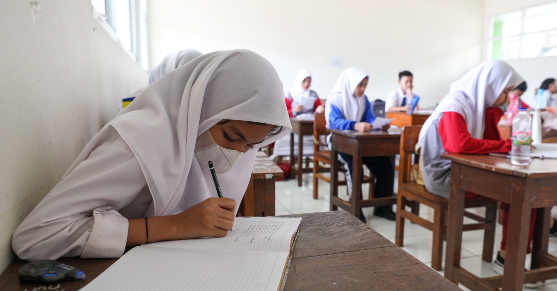 Siswa SMP belajar di kelas (Sumber gambar: JIBI/Bisnis/Suselo Jati)
