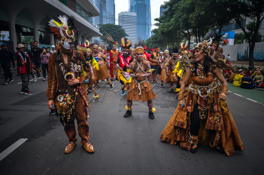 Peserta karnaval Kebangsaan Merah Putih, Jakarta 26 Mei 2024, mewakili provinsi Papua.