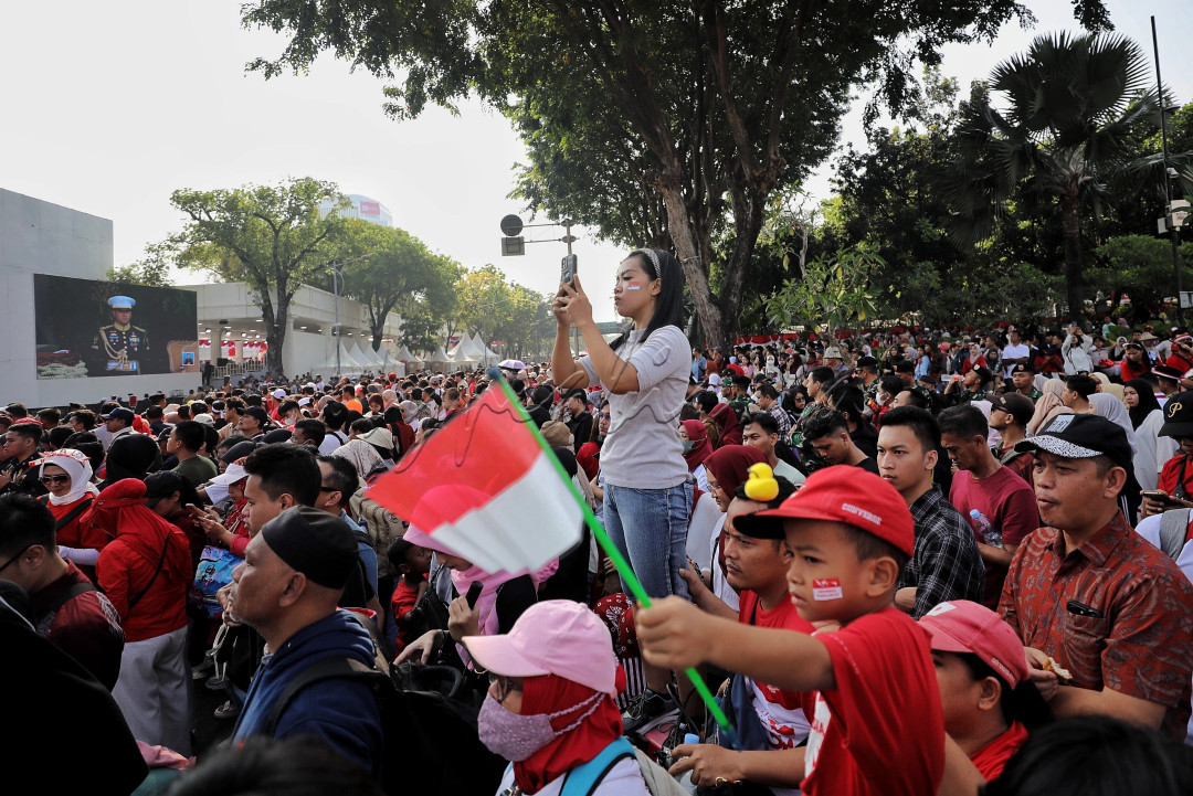 Ribuan warga masyarakat yang berada di kawasan Monas dan sekitar Istana Merdeka antusias menyaksikan prosesi arak-arakan atau kirab tersebut. Hypeabis/Eusebio Chrysnamurti&nbsp;<br />
<br />
&nbsp;