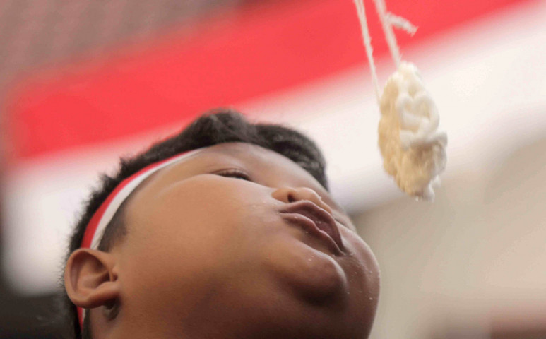 Ekspresi Lomba Makan Krupuk HUT RI