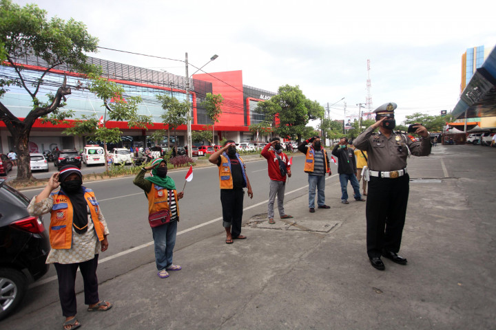 Jukir dan Polisi Upacara Virtual